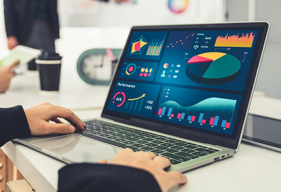 A dashboard of analytics displayed on a laptop screen