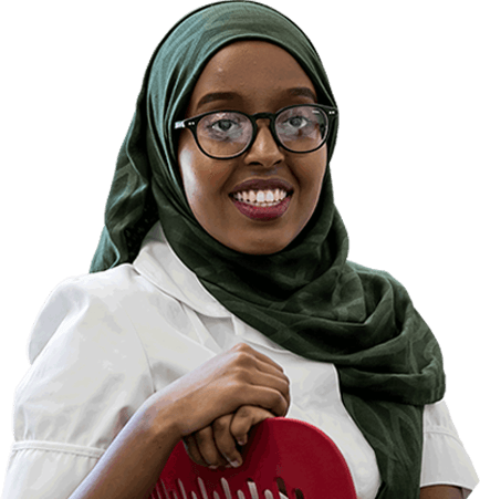 An Occupational Therapy degree student smiling and wearing a head scarf