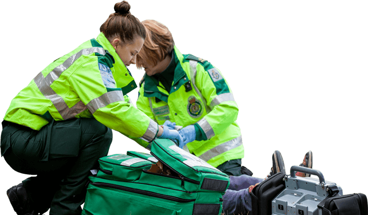 Two Paramedic Science degree students attending to a casualty