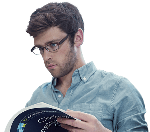A Psychology degree student reading a Psychology textbook